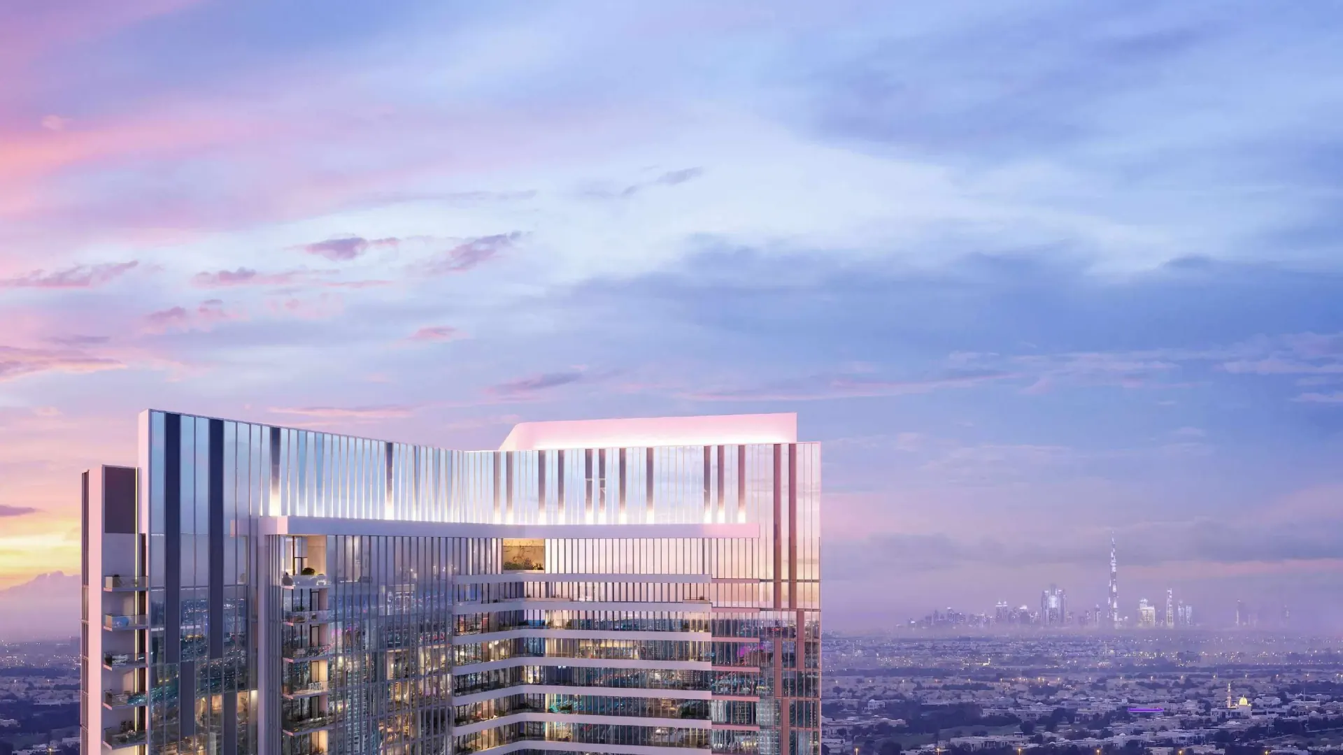 The crown of Tria at dusk with the Dubai skyline behind, developer render